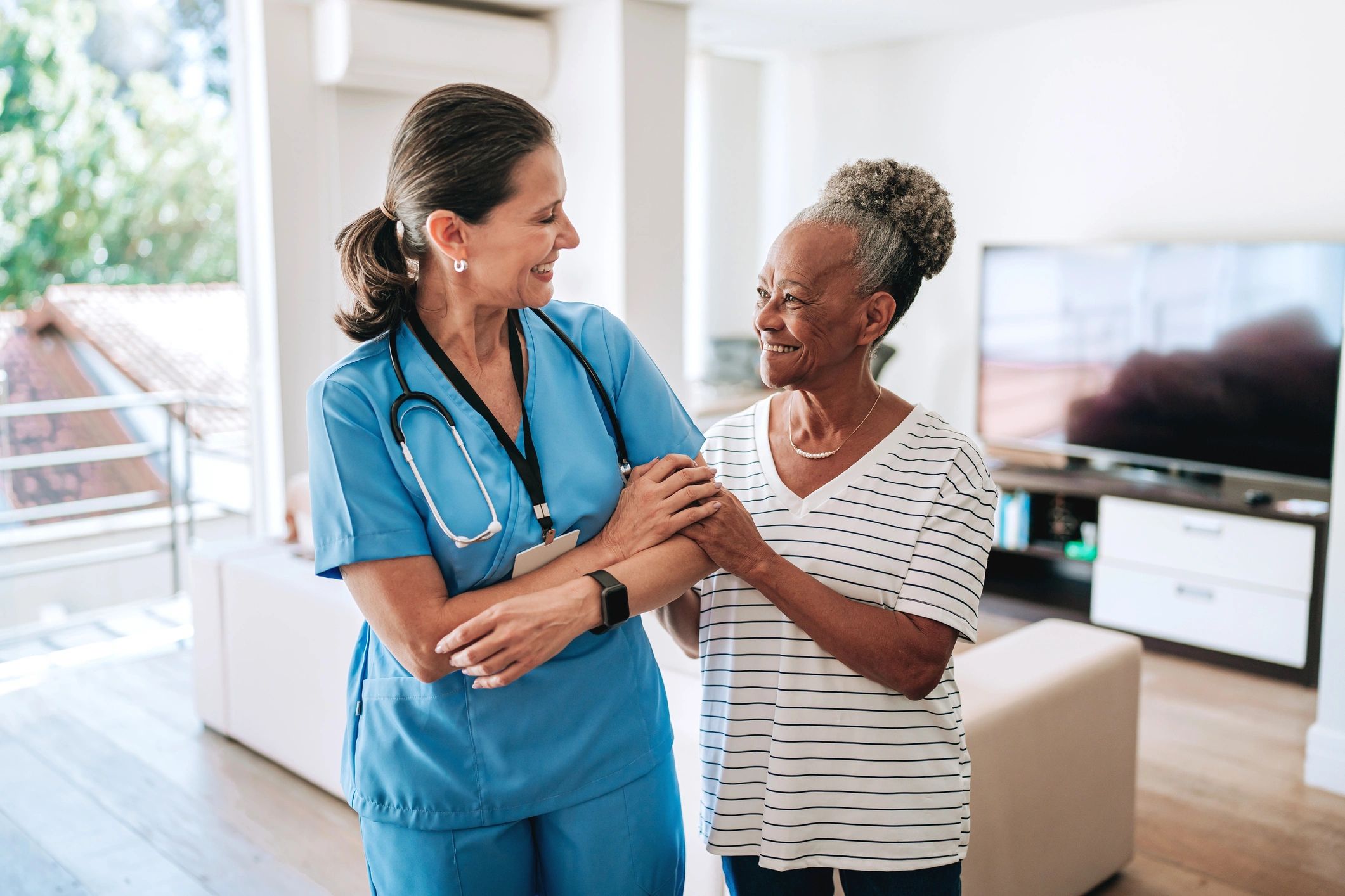 Healthcare professional offering compassionate home care support